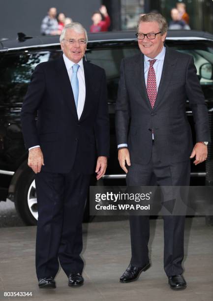Sir John Major and Australian High Commissioner Alexander Downer arrive for the Queen's Young Leaders Awards Dinner, at Australia House following the...