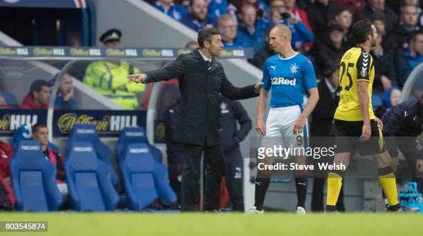 Rangers Manager Pedro Caixinha gives out his instructions to Kenny Miller during the UEFA Europa League first qualifying round match between Rangers...