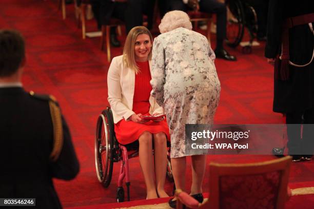 Miss Vladyslava Kravchenko from Malta receives a Queen's Young Leaders Award for 2017 from Queen Elizabeth II at the 2017 Queen's Young Leaders...