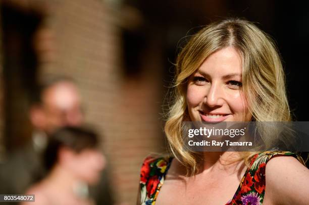 Actress Ari Graynor enters the "The Late Show With Stephen Colbert" taping at the Ed Sullivan Theater on June 29, 2017 in New York City.