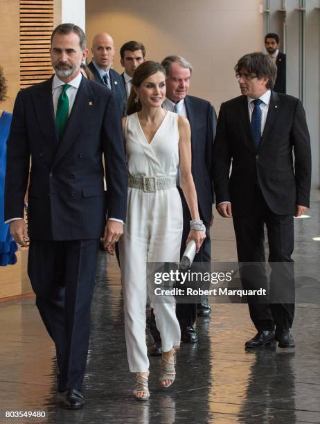 King Felipe VI of Spain , Queen Letizia of Spain and President of Catalunya Carles Puigdemont attend the 'Princesa de Girona' foundation awards held...