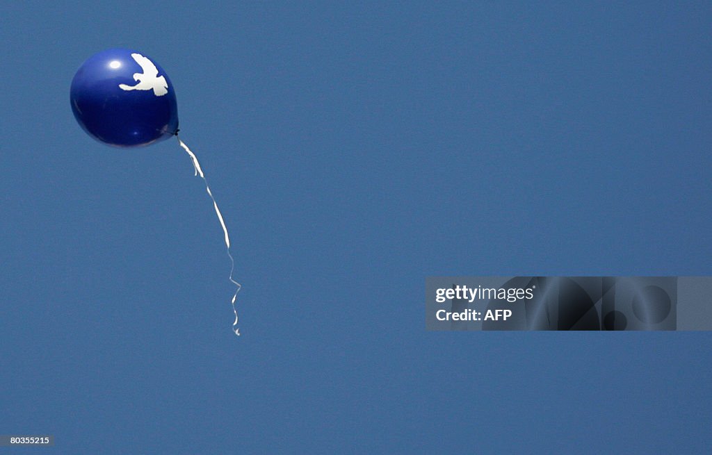 A balloon with a peace dove flies in the