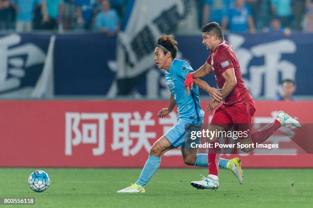 Shanghai FC Forward Elkeson De Oliveira Cardoso fights for the ball with Jiangsu FC Defender Hong Jeongho during the AFC Champions League 2017 Round...