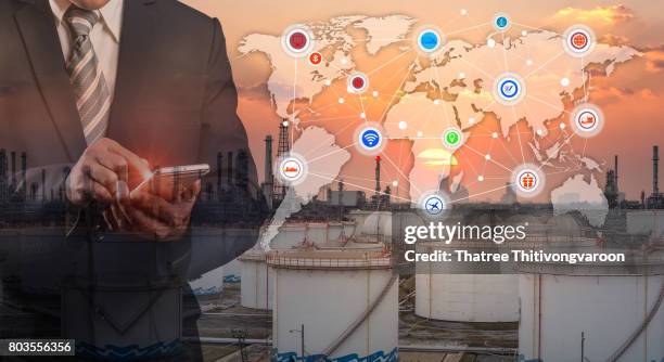 oil refinery at sunset with cyber and physical system icons diagram on industrial factory and infrastructure  refinery factory background - smoke physical structure imagens e fotografias de stock