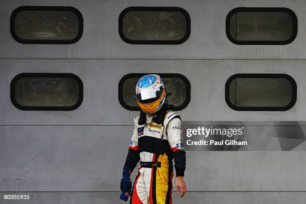 Fernando Alonso of Spain and Renault is seen in parc ferme following the Malaysian Formula One Grand Prix at the Sepang Circuit on March 23, 2008 in...