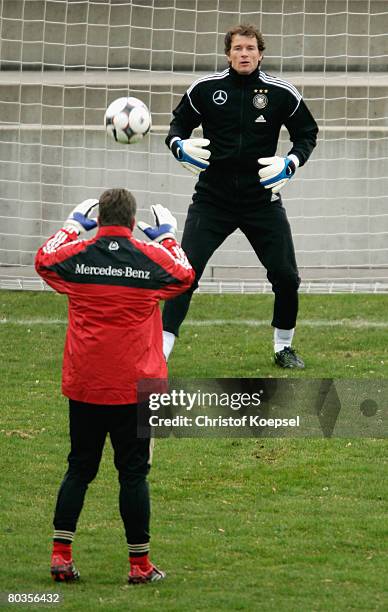 Goalkeeper coach Andreas Koepke throws a ball to Jens Lehmann during the German National Team training session at the Sport centrum Rankhof on March...