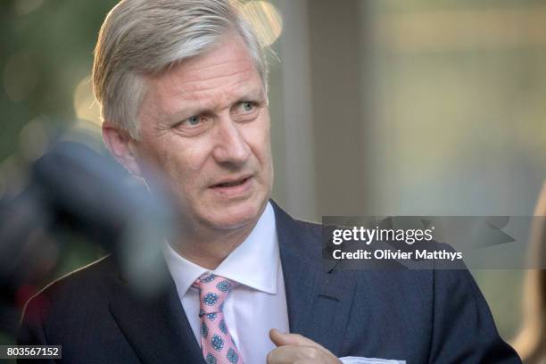 King Philippe of Belgium arrives at the Music Chapel where his mother Queen Paola invites to celebrate her 80th anniversary on June 29, 2017 in...