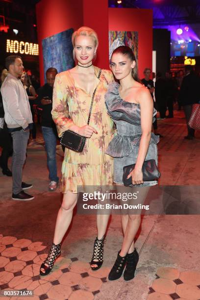 Franziska Knuppe and Lisa Tomaschewsky attend Bacardi X The Dean Collection Present: No Commission Berlin on June 29, 2017 in Berlin, Germany.