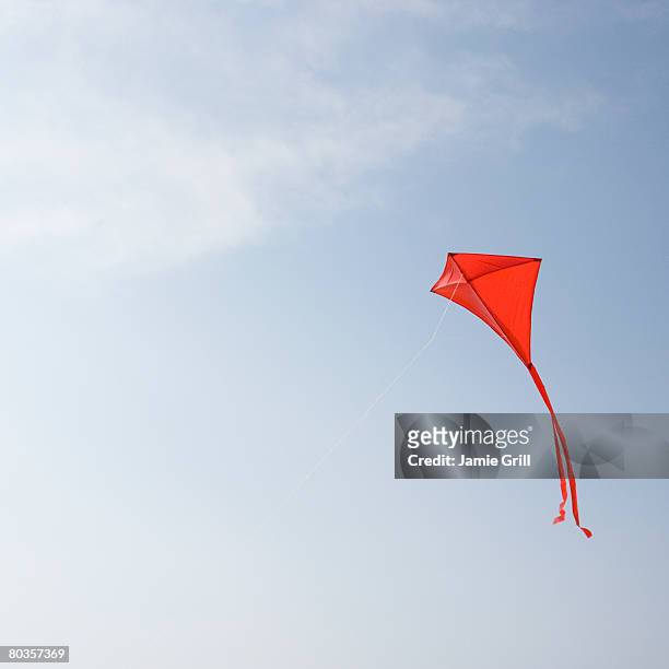 kite flying in air - kite toy stock-fotos und bilder