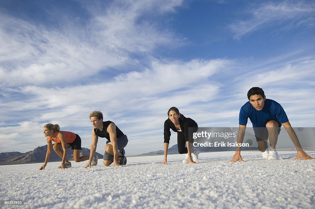 People at starting line on salt flats, Utah, United States