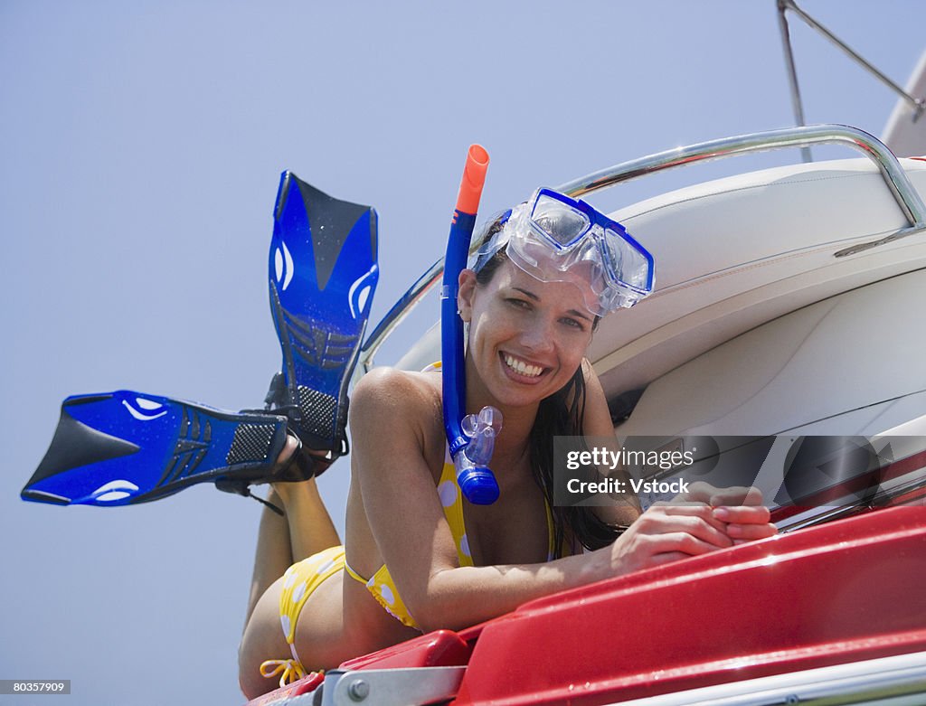 Woman in snorkeling gear on boat, Florida, United States
