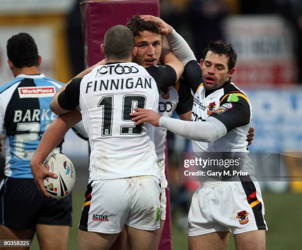 Sam Burgess of Bradford Bulls is congratulated by Simon Finnigan and his team mates after scoring a try during the engage Super League match between...