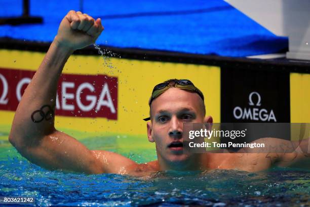 Caeleb Dressel celebrates after winning the Men's 100 LC Meter Butterfly Final during the 2017 Phillips 66 National Championships & World...