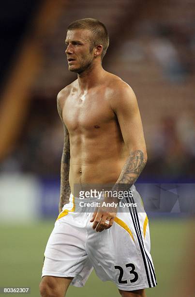 David Beckham of the Los Angeles Galaxy looks on shirtless after their game against Gamba Osaka in the Pan Pacific Championships on February 20, 2008...