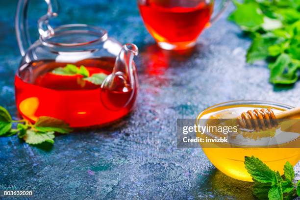 honey, tea and lemon balm - lemon balm tea stock pictures, royalty-free photos & images