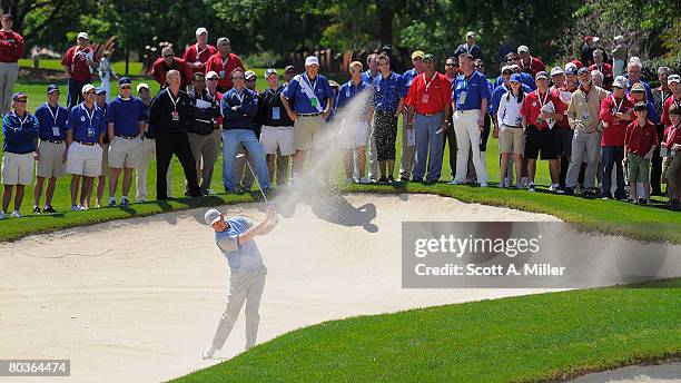 Ernie Els of South Africa hits from a fairway bunker on the third hole during the first day of the Tavistock Cup at Isleworth Golf and Country Club...