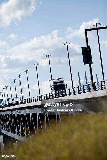 traffic on oresunds bridge skane sweden. - oresund bridge stock pictures, royalty-free photos & images