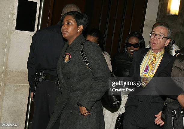 Nicole Paultre Bell and her attorney Sanford Rubenstein leave for lunch during the Sean Bell trial March 24, 2008 in the Queens borough of New York...