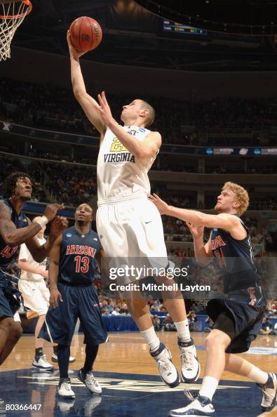 Alex Ruffa Alex Ruoff of the West Virginia Mountaineers goes to the basket... News ...