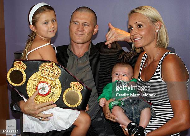 Danny Green announces his retirement from professional boxing with daugher Chloe Elizabeth, son Archie and wife Nina during a press conference at the...