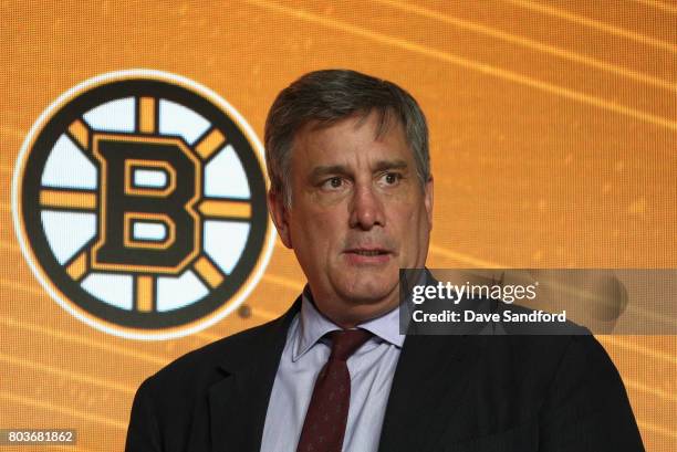 President of hockey operations Cam Neely of the Boston Bruins stands onstage during Round One of the 2017 NHL Draft at United Center on June 23, 2017...