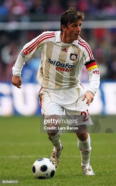 Bernd Schneider of Leverkusen runs with the ball during the Bundesliga match between Bayern Munich and Bayer Leverkusen at the Allianz Arena on March...