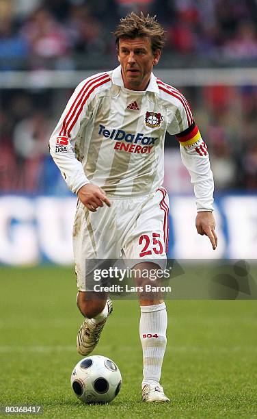 Bernd Schneider of Leverkusen runs with the ball during the Bundesliga match between Bayern Munich and Bayer Leverkusen at the Allianz Arena on March...