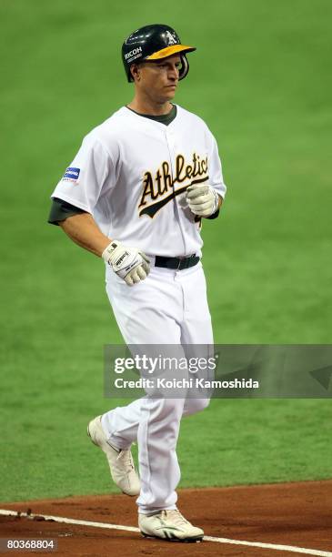 Infielder Mark Ellis of Oakland Athletics completes a home run during the MLB Opening game between Boston Red Sox and Oakland Athletics at Tokyo Dome...