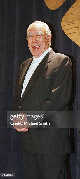 Actor Anthony Quinn laughs as he poses for photographers at the Hispanic Heritage Awards September 7, 2000 in Washington D.C.