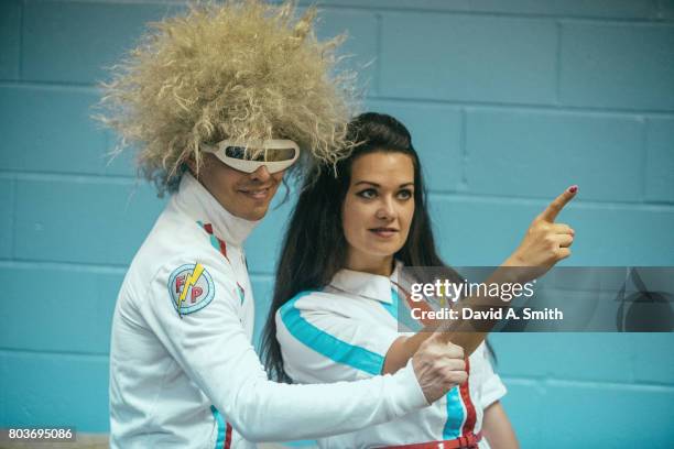 Tyson Markley, aka Tyson Plastic and Miranda Markley, aka Miranda Plastic of The Fantastic Plastics pose backstage during the 2017 Vans Warped Tour...