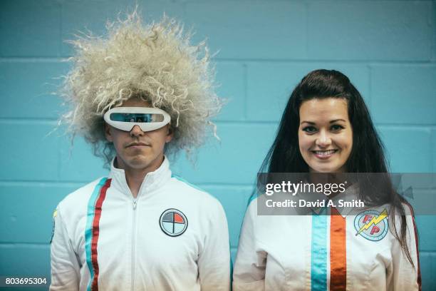 Tyson Markley, aka Tyson Plastic and Miranda Markley, aka Miranda Plastic of The Fantastic Plastics pose backstage during the 2017 Vans Warped Tour...