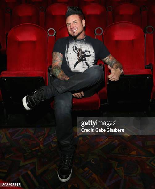 Co-producer of "Hired Gun: Out of the Shadows, into the Spotlight" guitarist Jason Hook of Five Finger Death Punch attends a meet-and-greet and...