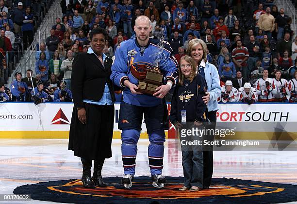 Niclas Havelid of the Atlanta Thrashers receives the Gilner-Reeves Award for community service before the game against the Washington Capitals at...