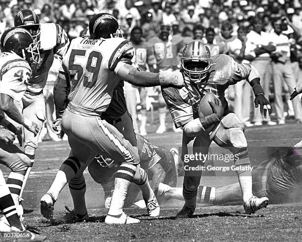 Detroit Lions running back Billy Sims carries the football during the Lions 28-23 loss to the San Diego Chargers on September 13, 1981 at Jack Murphy...