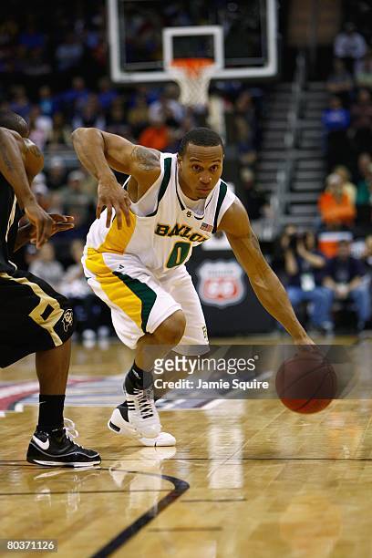 Curtis Jerrells of the Baylor Bears dribbles against the Colorado Buffaloes during day 1 of the Big 12 Men's Basketball Tournament on March 13, 2008...