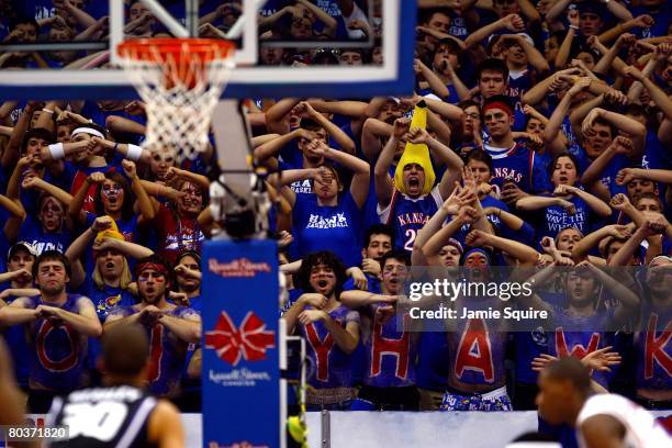 Fans of the Kansas Jayhawks try to distract a free throw attempt by Michael Beasley of the Kansas State Wildcats during their game on March 1, 2008...