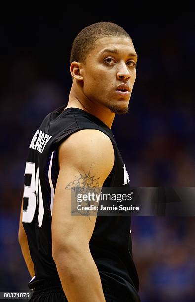 Michael Beasley of the Kansas State Wildcats looks on during a break in game action against the Kansas Jayhawks on March 1, 2008 at Allen Fieldhouse...