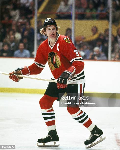 Keith Magnuson of the Chicago Black Hawks skates in game against the Boston Bruins at Boston Garden.