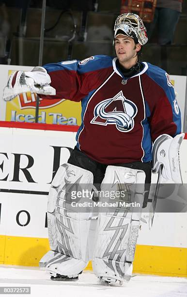 Goaltender Jose Theodore of the Colorado Avalanche skates on the ice after being named first star of the game against the Calgary Flames at the Pepsi...
