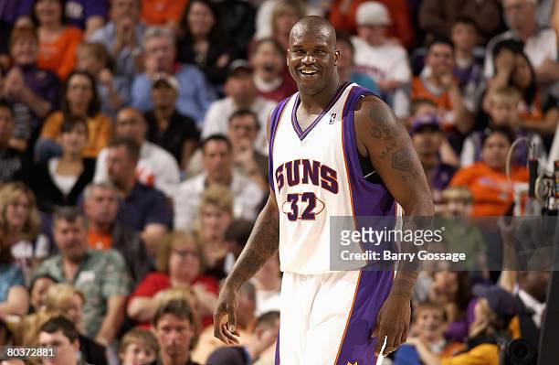 Shaquille O'Neal of the Phoenix Suns cracks a smile during the game against the Sacramento Kings at U.S. Airways Center on March 15, 2008 in Phoenix,...