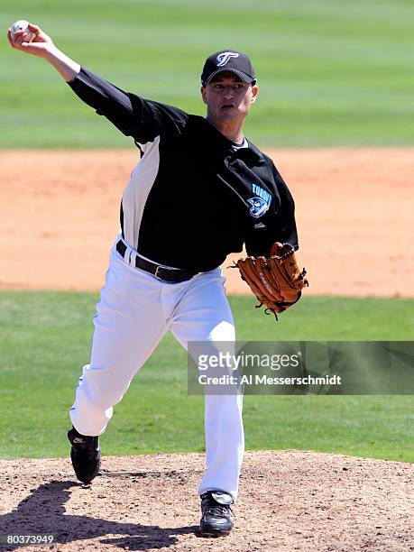 Pitcher Jason Frasor of the Toronto Blue Jays throws in relief against the Tampa Bay Rays March 25, 2008 at Knology Park in Dunedin, Florida. The...