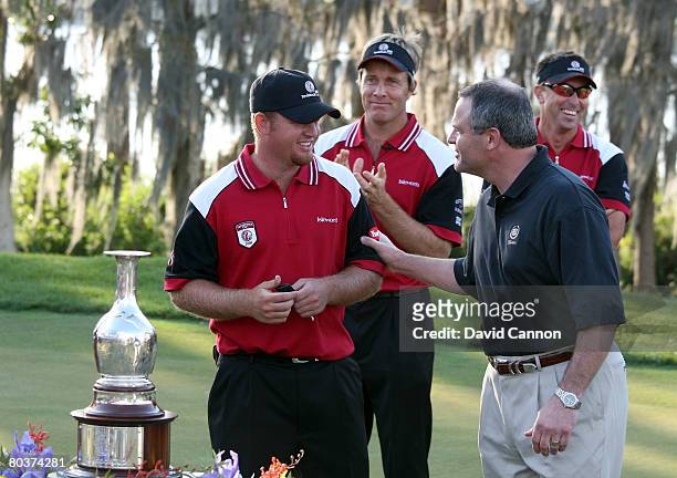 Holmes of the USA wins the keys to a new Cadillac for the nearest to the pin at the 15th hole after the second days play of the Tavistock Cup at...