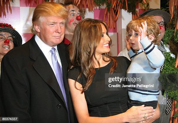 Donald Trump, his wife Melania Trump and son Barron Trump attend the 17th Annual Bunny Hop at FAO Schwartz on March 11, 2008 in New York City.
