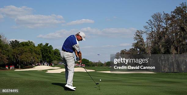 Ernie Els of South Africa and the Captain of the Lake Nona Team hits his second shot ot the 17th hole during the second days play of the Tavistock...