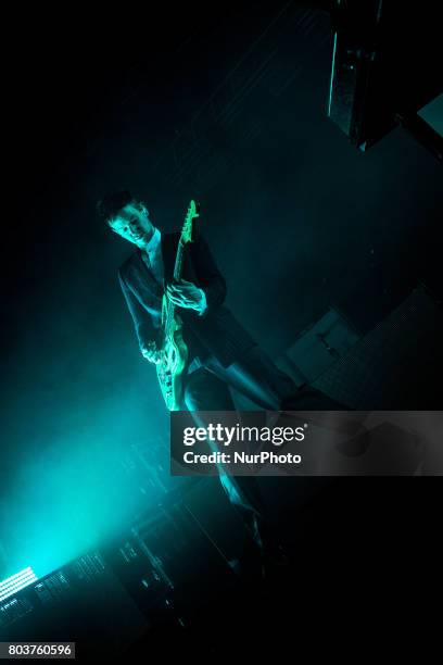 Adam Hann of the english rock band The 1975 pictured on stage as they perform at Fabrique in Milan, Italy, on 29 June 2017. The 1975 announced the...