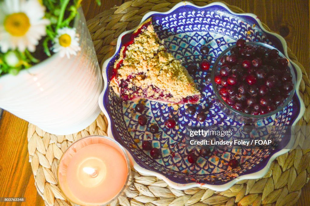 Cake with berry fruits served on table