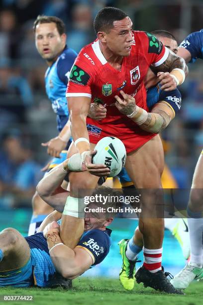 Tyson Frizell of the Dragons is tackled during the round 17 NRL match between the Gold Coast Titans and the St George Illawarra Dragons at Cbus Super...