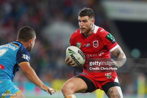 Josh Dugan of the Dragons runs the ball during the round 17 NRL match between the Gold Coast Titans and the St George Illawarra Dragons at Cbus Super...