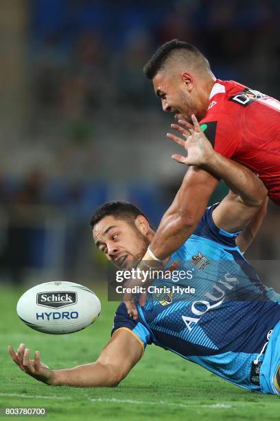 Jarryd Hayne of the Titans loses the ball during the round 17 NRL match between the Gold Coast Titans and the St George Illawarra Dragons at Cbus...