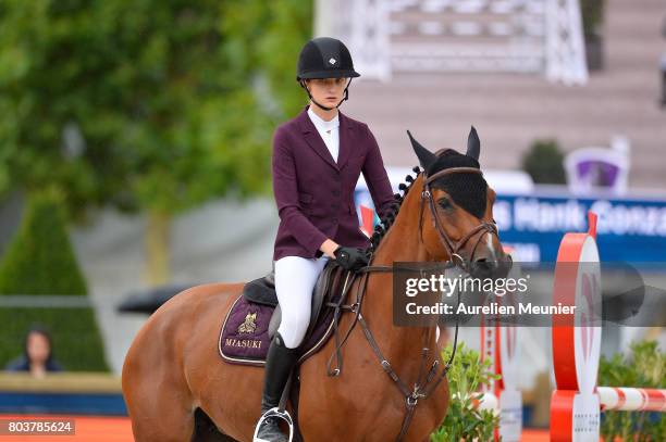 Mathilde Pinault of France and Lotta compete on day 1 in the 4th Longines Paris Eiffel Jumping competiton on June 30, 2017 in Paris, France.